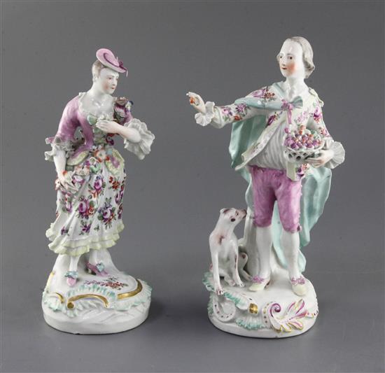 A pair of early Derby figures of a gentleman and his companion, c.1758, h. 25cm and 23.5cm